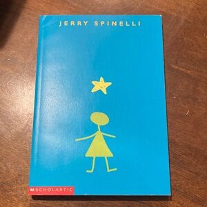 Scholastic Blue Paperback Book with Yellow Illustration